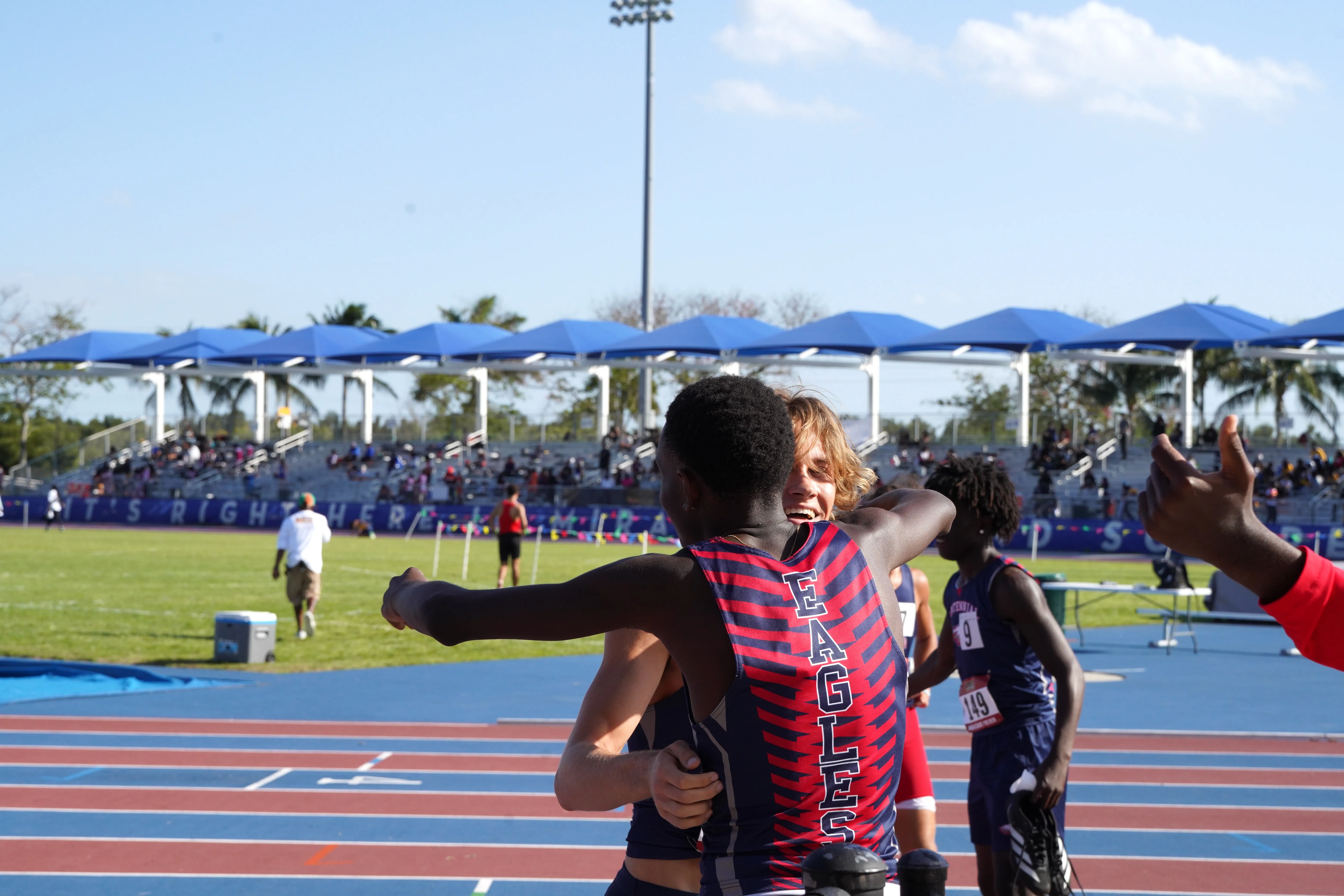 Athletes hugging