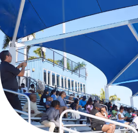 Male athletes in mid-run.